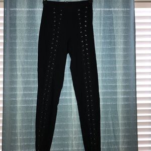 Black lace up pants.